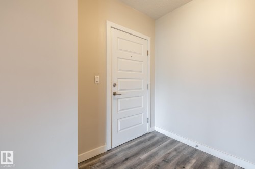 130 5151 Windermere Boulevard, Edmonton, AB - Indoor Photo Showing Other Room