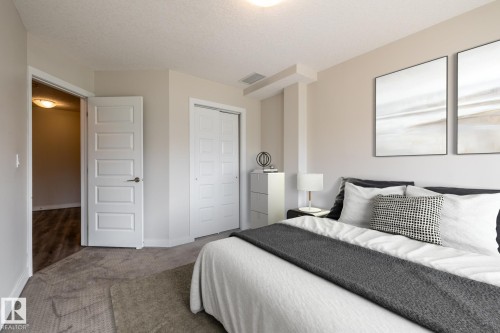 130 5151 Windermere Boulevard, Edmonton, AB - Indoor Photo Showing Bedroom