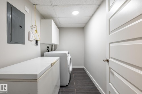 130 5151 Windermere Boulevard, Edmonton, AB - Indoor Photo Showing Laundry Room