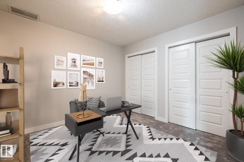 130 5151 Windermere Boulevard, Edmonton, AB - Indoor Photo Showing Other Room