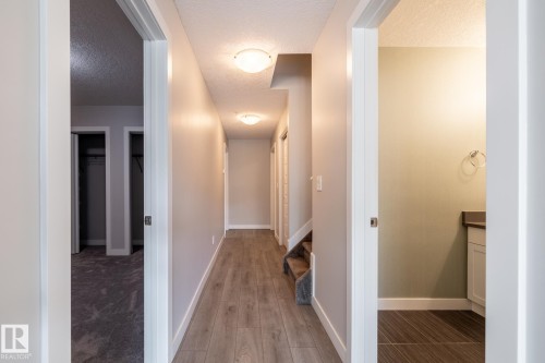 130 5151 Windermere Boulevard, Edmonton, AB - Indoor Photo Showing Other Room