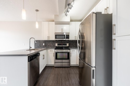 130 5151 Windermere Boulevard, Edmonton, AB - Indoor Photo Showing Kitchen With Upgraded Kitchen