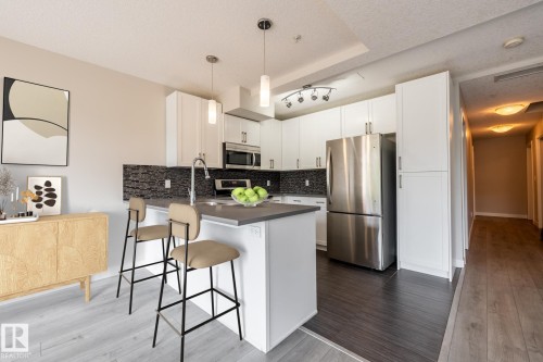 130 5151 Windermere Boulevard, Edmonton, AB - Indoor Photo Showing Kitchen With Upgraded Kitchen