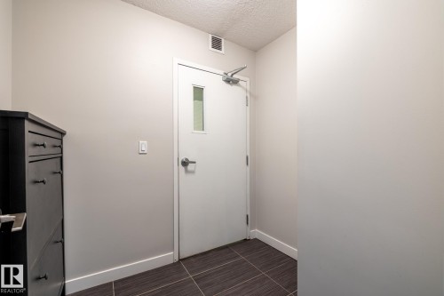 130 5151 Windermere Boulevard, Edmonton, AB - Indoor Photo Showing Other Room