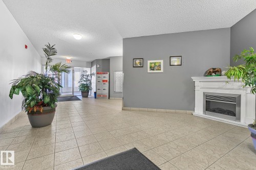 308 9120 156 Street, Edmonton, AB - Indoor With Fireplace