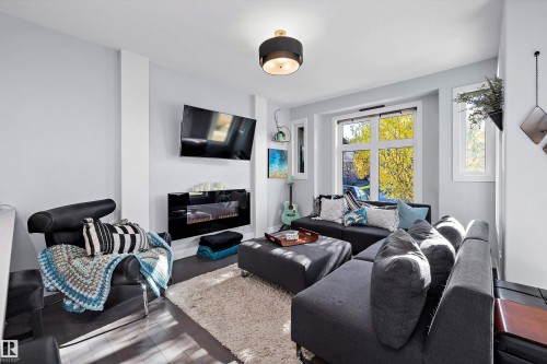 4 Fosbury Link, Sherwood Park, AB - Indoor Photo Showing Living Room With Fireplace