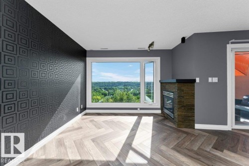 214 10105 95 Street, Edmonton, AB - Indoor With Fireplace