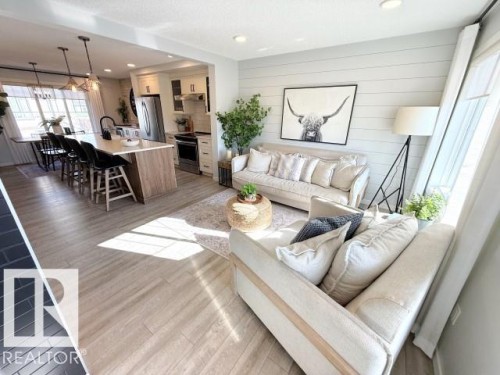 67 50 Mclaughlin Drive, Spruce Grove, AB - Indoor Photo Showing Living Room