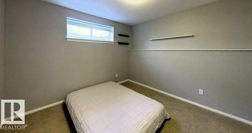 916 62A Street, Edson, AB - Indoor Photo Showing Bedroom
