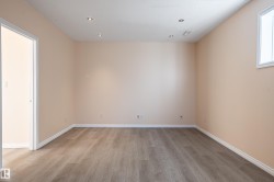 Spare room featuring light wood finished floors and recessed lighting - 