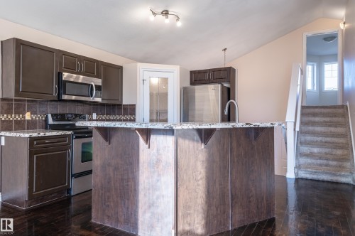 16311 55 Street Nw, Edmonton, AB - Indoor Photo Showing Kitchen With Upgraded Kitchen