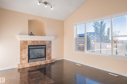 16311 55 Street Nw, Edmonton, AB - Indoor Photo Showing Living Room With Fireplace