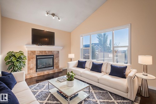 16311 55 Street Nw, Edmonton, AB - Indoor Photo Showing Living Room With Fireplace