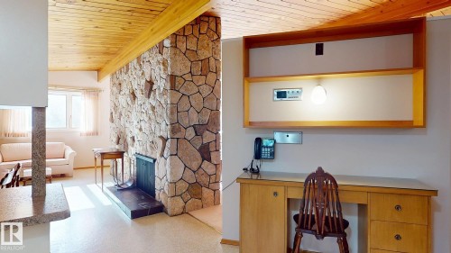 13 Valleyview Crescent, Edmonton, AB - Indoor Photo Showing Other Room With Fireplace