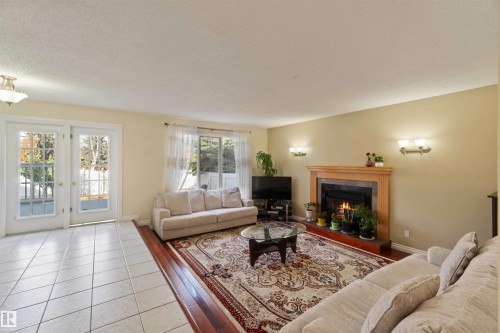 18204 61 Avenue, Edmonton, AB - Indoor Photo Showing Living Room With Fireplace