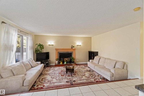 18204 61 Avenue, Edmonton, AB - Indoor Photo Showing Living Room With Fireplace