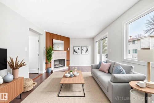 1189 Hooke Road, Edmonton, AB - Indoor Photo Showing Living Room With Fireplace