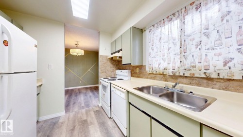 45 4403 Riverbend Road, Edmonton, AB - Indoor Photo Showing Kitchen With Double Sink