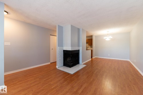67 1503 Mill Woods Road, Edmonton, AB - Indoor With Fireplace