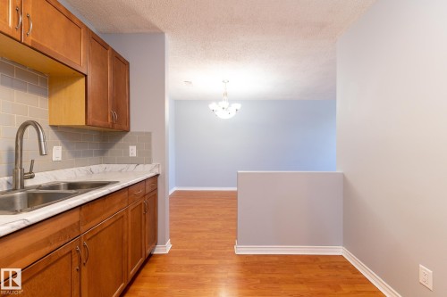 67 1503 Mill Woods Road, Edmonton, AB - Indoor Photo Showing Kitchen With Double Sink