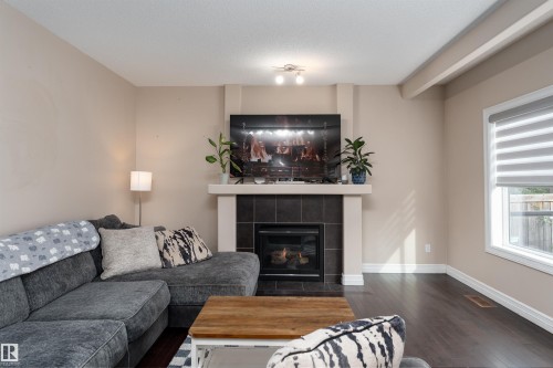 11535 16 Avenue, Edmonton, AB - Indoor Photo Showing Living Room With Fireplace
