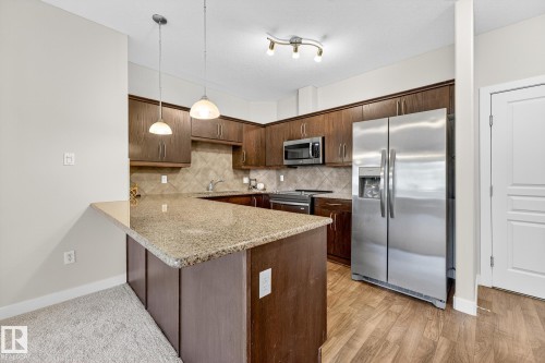 4101 7323 South Terwillegar Drive, Edmonton, AB - Indoor Photo Showing Kitchen With Upgraded Kitchen