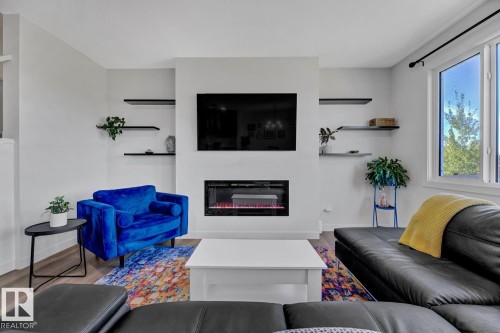 5 Elwyck Gate, Spruce Grove, AB - Indoor Photo Showing Living Room With Fireplace