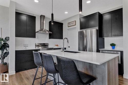 5 Elwyck Gate, Spruce Grove, AB - Indoor Photo Showing Kitchen With Stainless Steel Kitchen With Upgraded Kitchen