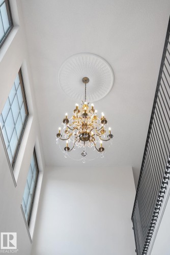 Detailed view of a chandelier - 183 Windermere Drive, Edmonton, AB - Indoor Photo Showing Other Room
