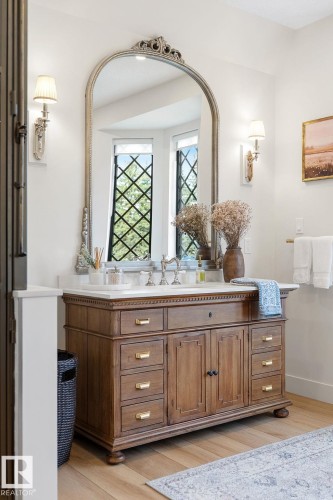 Bathroom featuring vanity and light wood-style flooring - 183 Windermere Drive, Edmonton, AB - Indoor