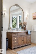 Bathroom featuring vanity and light wood-style flooring - 