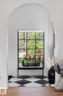 Detailed view of arched walkways and baseboards - 