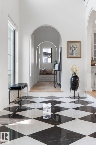 Hallway featuring arched walkways and a high ceiling - 183 Windermere Drive, Edmonton, AB - Indoor Photo Showing Other Room