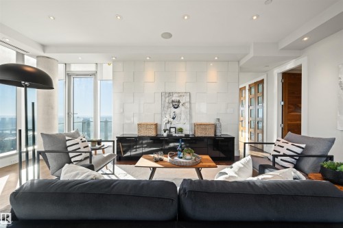 Living area with recessed lighting and expansive windows - 3201 11969 Jasper Avenue, Edmonton, AB - Indoor Photo Showing Living Room