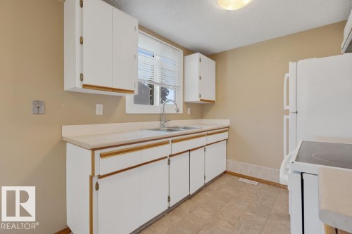 5418 144B Avenue, Edmonton, AB - Indoor Photo Showing Kitchen With Double Sink