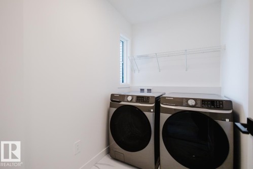 8219 Kiriak Loop, Edmonton, AB - Indoor Photo Showing Laundry Room