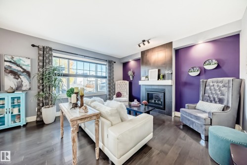 3411 8 Street, Edmonton, AB - Indoor Photo Showing Living Room With Fireplace