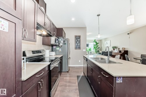 1426 26 Avenue, Edmonton, AB - Indoor Photo Showing Kitchen With Double Sink