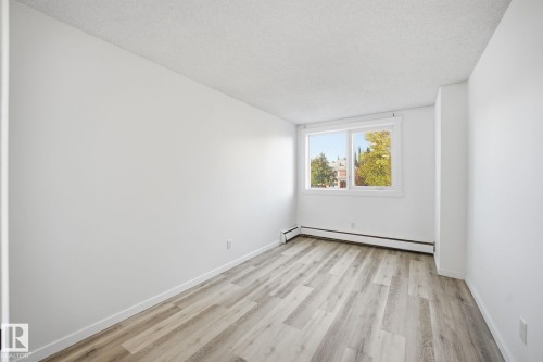 205 9028 Jasper Avenue, Edmonton, AB - Indoor Photo Showing Other Room