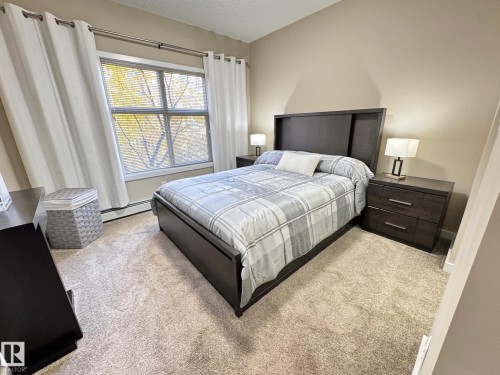 218 508 Griesbach Parade, Edmonton, AB - Indoor Photo Showing Bedroom