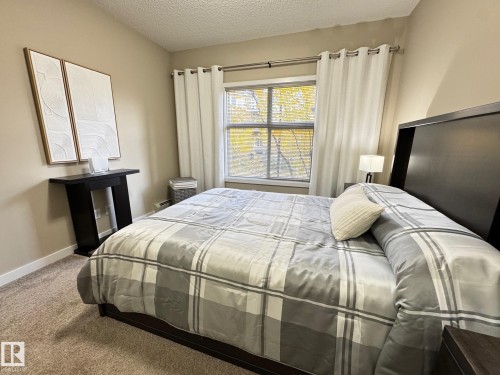218 508 Griesbach Parade, Edmonton, AB - Indoor Photo Showing Bedroom