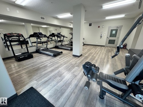 218 508 Griesbach Parade, Edmonton, AB - Indoor Photo Showing Gym Room