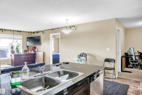 424 1510 Watt Drive, Edmonton, AB - Indoor Photo Showing Kitchen With Double Sink