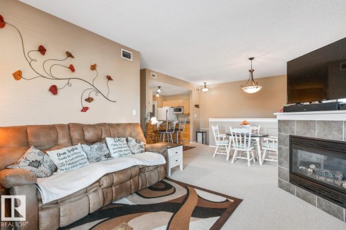 10 2508 Hanna Crescent, Edmonton, AB - Indoor Photo Showing Living Room With Fireplace
