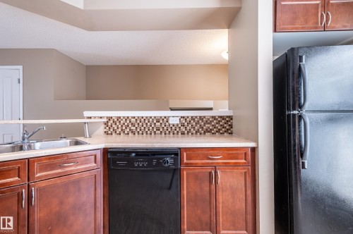 143 5604 199 Street, Edmonton, AB - Indoor Photo Showing Kitchen With Double Sink