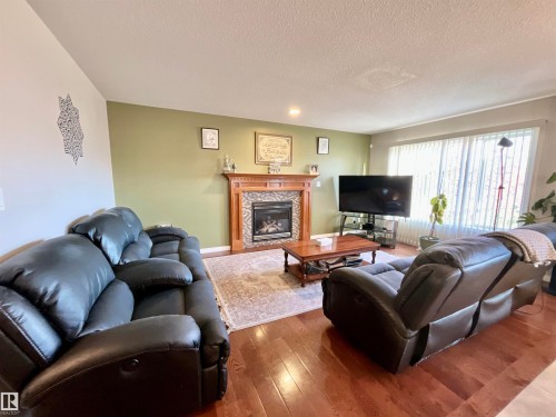 13707 149 Avenue, Edmonton, AB - Indoor Photo Showing Living Room With Fireplace