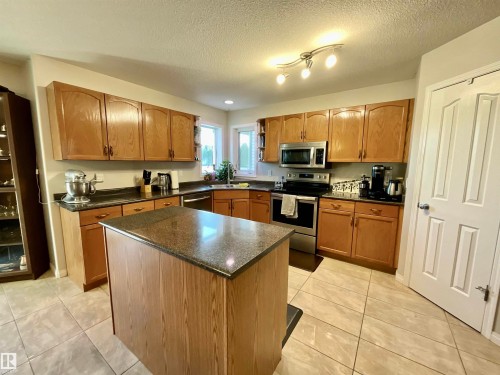 13707 149 Avenue, Edmonton, AB - Indoor Photo Showing Kitchen With Double Sink