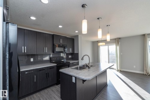 7257 Armour Crescent, Edmonton, AB - Indoor Photo Showing Kitchen With Double Sink With Upgraded Kitchen