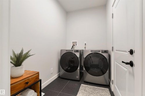 13 1005 Calahoo Road, Spruce Grove, AB - Indoor Photo Showing Laundry Room