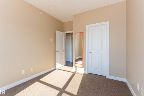 410 2584 Anderson Way, Edmonton, AB - Indoor Photo Showing Other Room